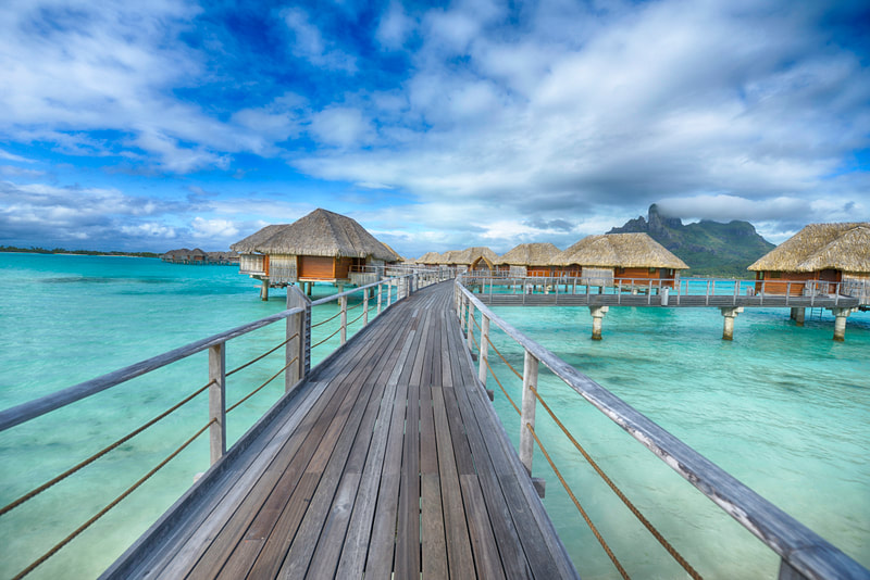 Boardwalk to overwater bungalows in Maldives